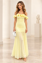 Light yellow satin A-line prom dress with square neckline, ruffle cap sleeves, fitted waist and voluminous floor length pleated skirt by Graceprom