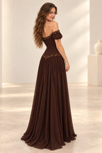 Back view of a brown chiffon Graceprom prom dress featuring a low curved neckline, embellished dropped waist and flowing floor-length skirt.