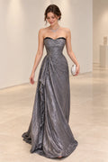 Silver gray chiffon A-line evening dress featuring a strapless sweetheart neckline, ruched bodice, asymmetrical waist draping, and flowing floor-length skirt.