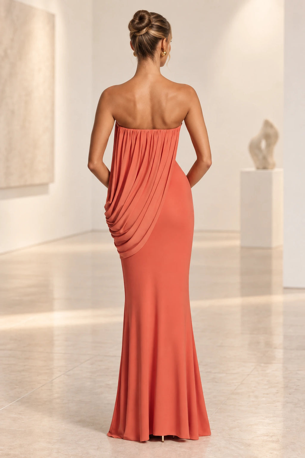 Coral orange draped maxi wedding guest dress back view