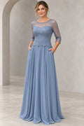 Dusty blue A-line Mother of the Bride Dress with illusion scoop neckline, half sleeves, beaded bodice and floor-length skirt