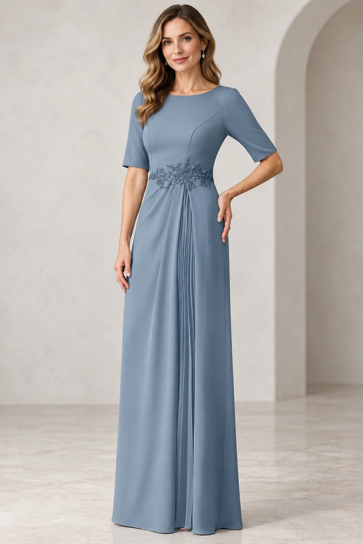 Dusty blue Mother of the Bride Dress with round neckline, half sleeves, lace waist detail and pleated floor-length skirt
