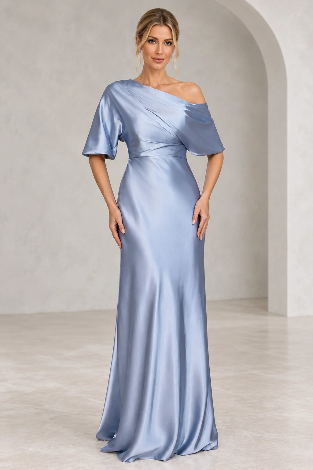 Dusty blue one shoulder mother of bride dress with short sleeves and floor length sheath silhouette