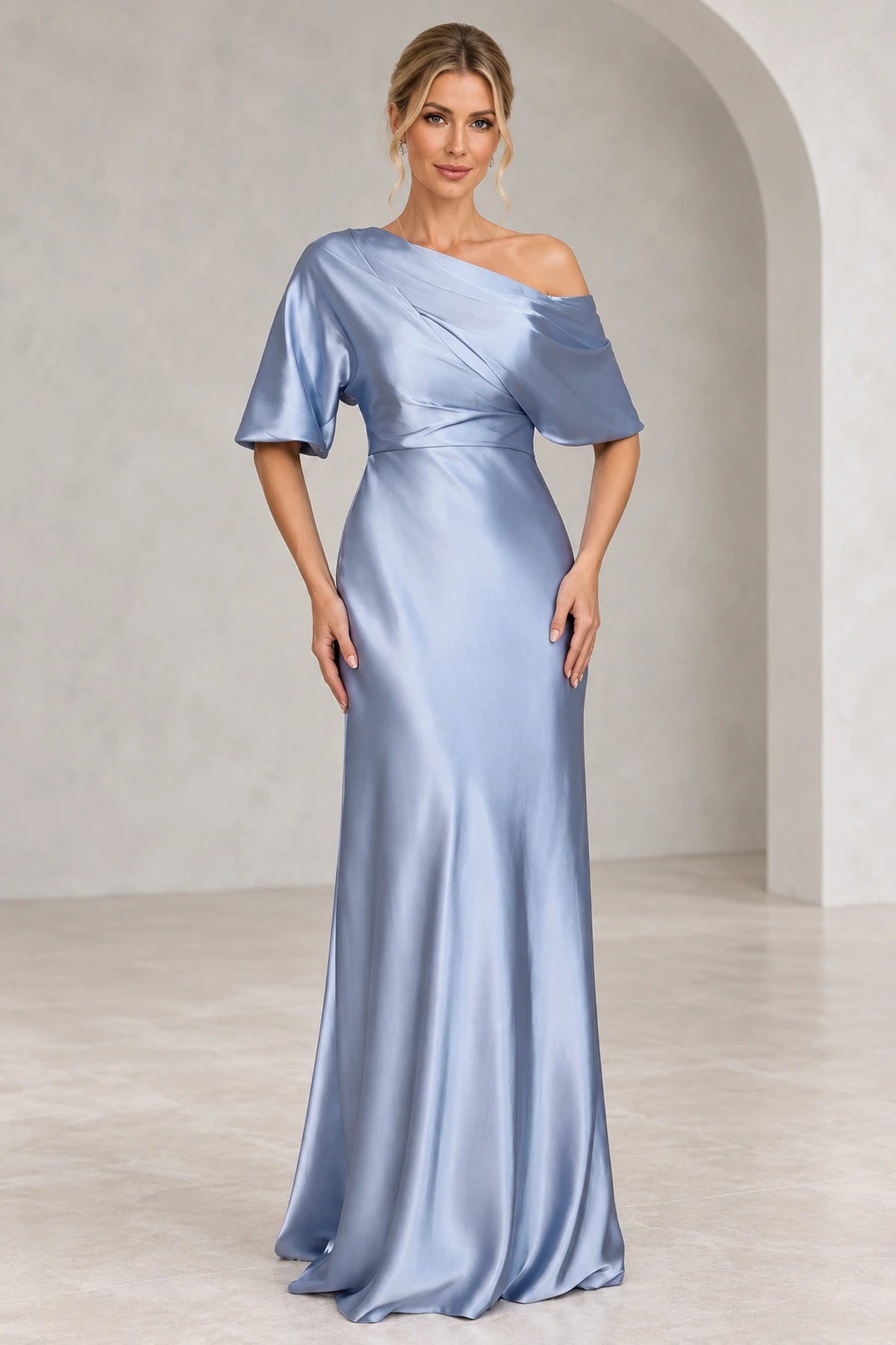 Dusty blue one shoulder mother of bride dress with short sleeves and floor length sheath silhouette