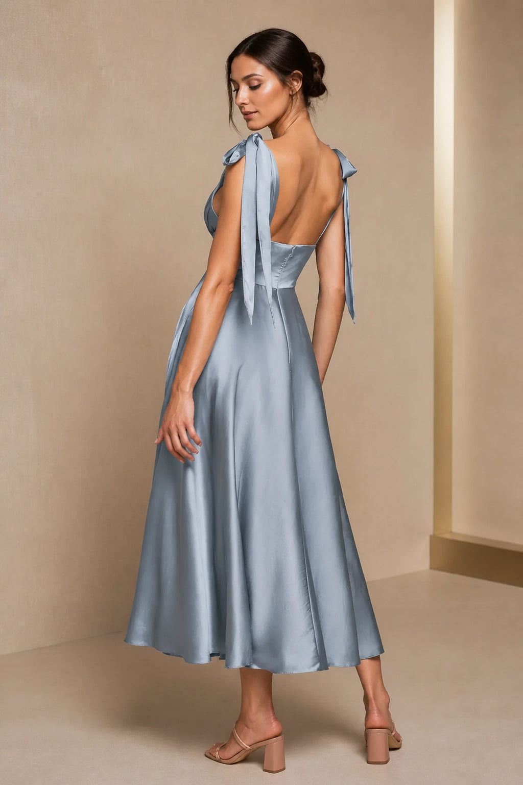 Dusty blue A-line V-neck tie strap midi bridesmaid dress with ruched bodice and low back, front and back view by Vedress