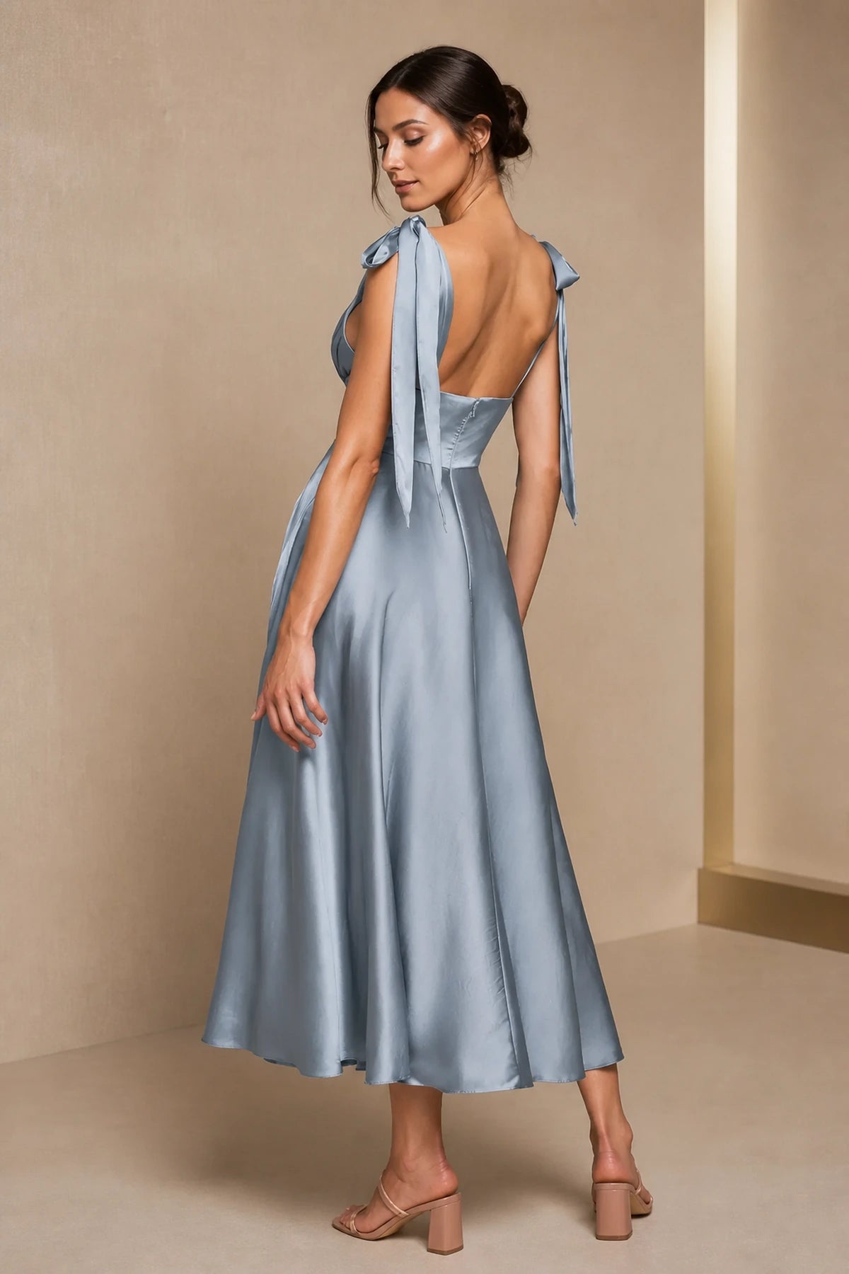 Dusty blue A-line V-neck tie strap midi bridesmaid dress with ruched bodice and low back, front and back view by Vedress