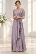 Dusty mauve A-line Mother of the Bride Dress with illusion neckline, lace bodice, bell sleeves and cascading ruffle