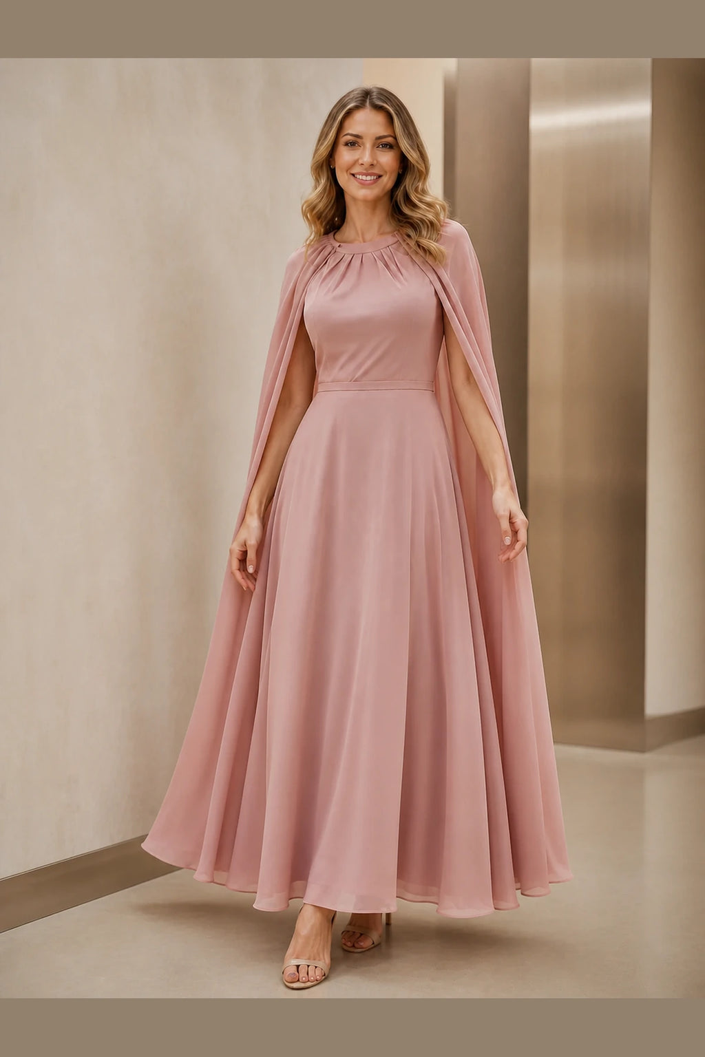 Vedress dusty rose mother of the bride dress with draped back flowing cape panels and floor-length A-line skirt back view