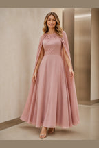 Vedress dusty rose mother of the bride dress with draped back flowing cape panels and floor-length A-line skirt back view
