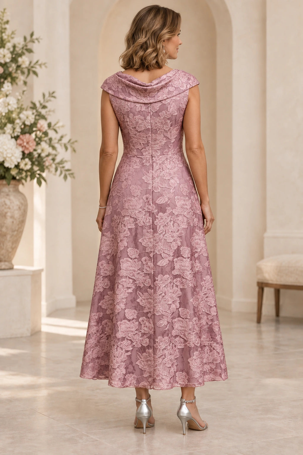 Dusty rose mother of the bride dress with cowl back zipper closure and floral lace skirt