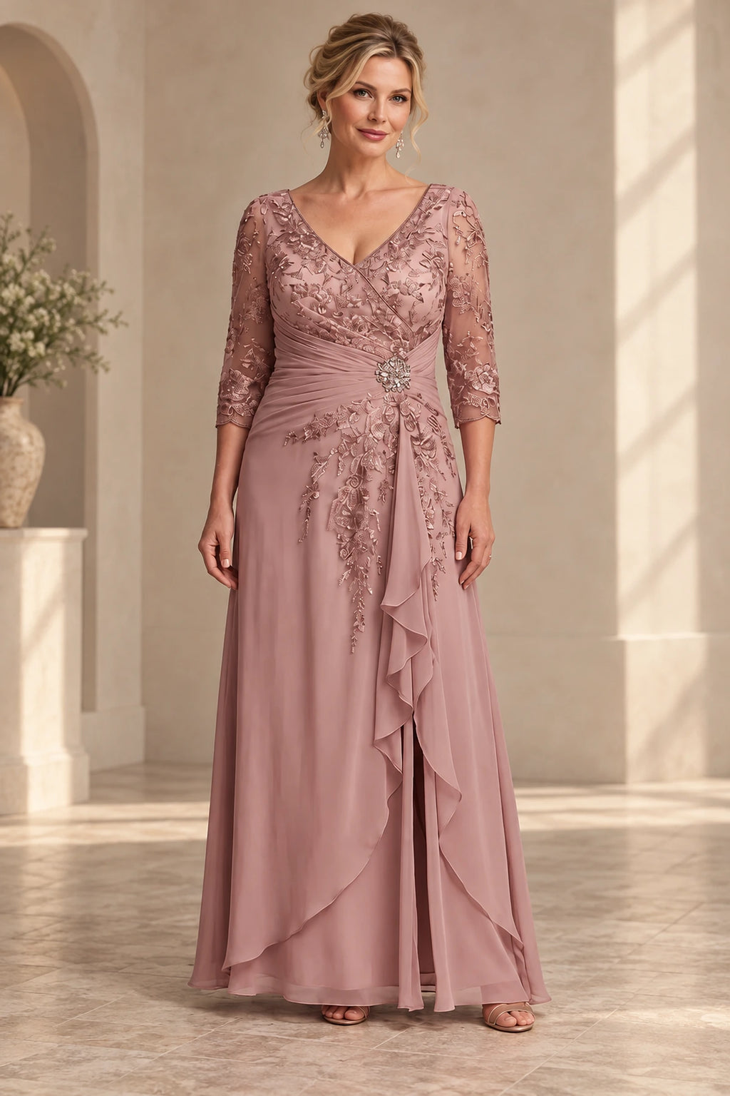 Dusty rose A-line Mother of the Bride Dress with V-neck lace bodice, three-quarter sleeves, jeweled waist and draped skirt