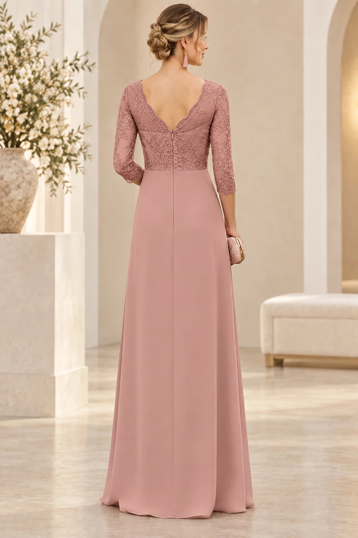 Back view of dusty rose Mother of the Bride Dress with V-back, floral lace bodice and long A-line skirt