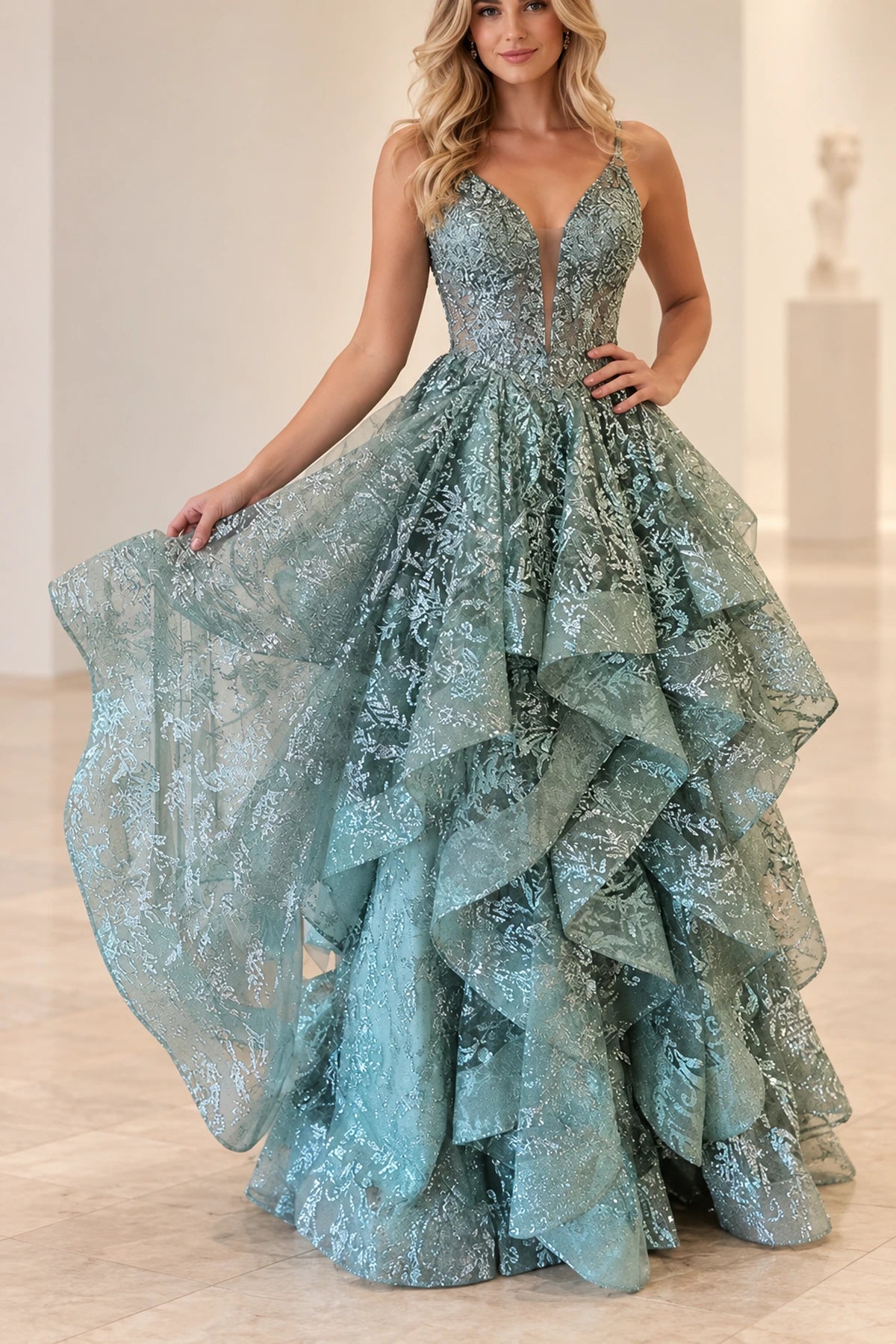 Dusty sage green ball gown prom dress with plunging V-neckline, floral embellished illusion bodice, and cascading tiered tulle ruffles by Graceprom.