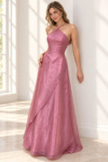 Elegant dusty rose chiffon prom dress with crisscross halter neckline, sparkling beaded bodice, asymmetrical draped overlay and flowing A-line skirt