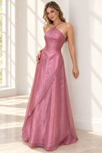 Elegant dusty rose chiffon prom dress with crisscross halter neckline, sparkling beaded bodice, asymmetrical draped overlay and flowing A-line skirt
