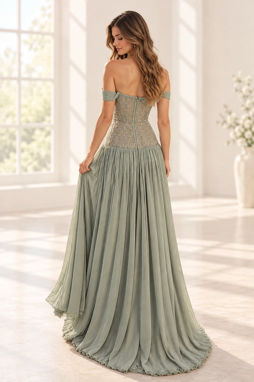 Sage green chiffon A-line prom dress back view featuring off-the-shoulder sleeves, intricate beaded corset embroidery, center zipper and flowing floor-length skirt
