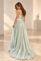 Ice blue chiffon prom dress back view featuring a strapless low back, fitted bodice, pointed waist and soft flowing A-line skirt