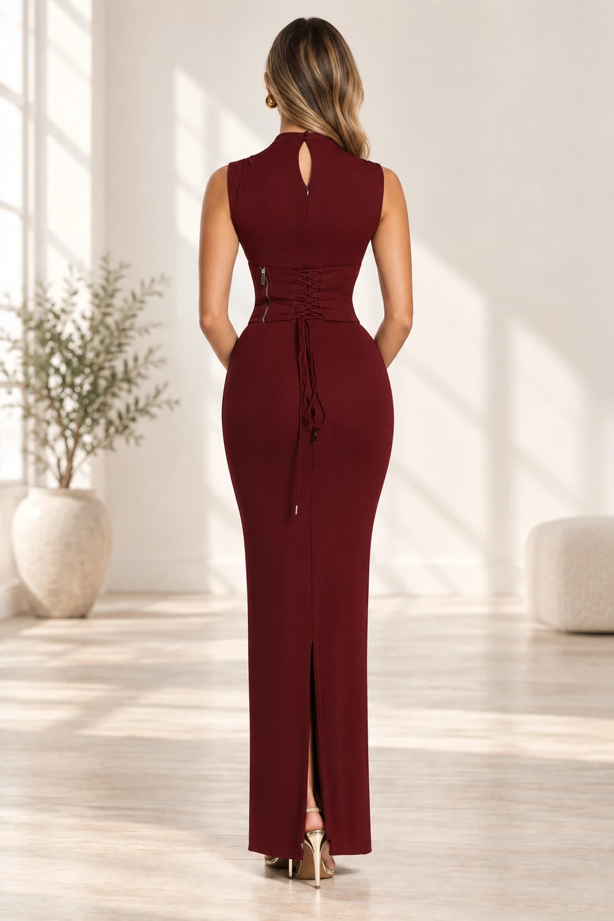 Corset lace up back detail of elegant formal wedding guest gown