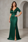Vedress emerald green mother of the bride dress with V-neck floral applique sleeves defined waist front slit and floor-length sheath silhouette