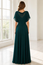 Vedress emerald green mother of the bride dress with draped back flutter sleeves ruched waist and floor-length A-line skirt back view