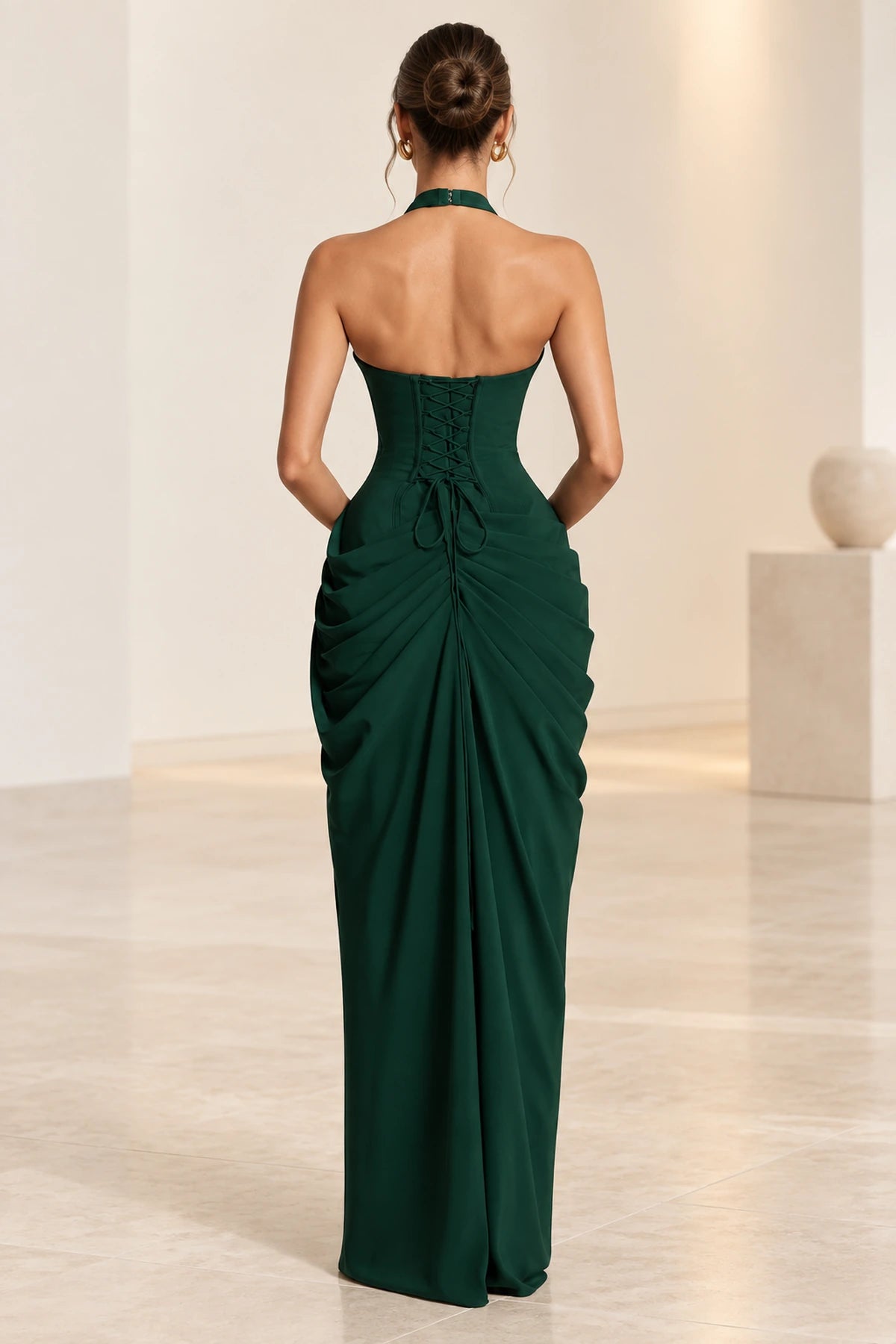 Emerald green formal gown with lace up corset back and floor length design