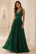 Emerald green mother of the bride dress with V-neckline, sequin bodice, sleeveless design and floor-length A-line skirt