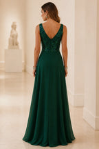 Back view of emerald green mother of the bride dress with V-back, sequin bodice, center zipper and floor-length A-line skirt