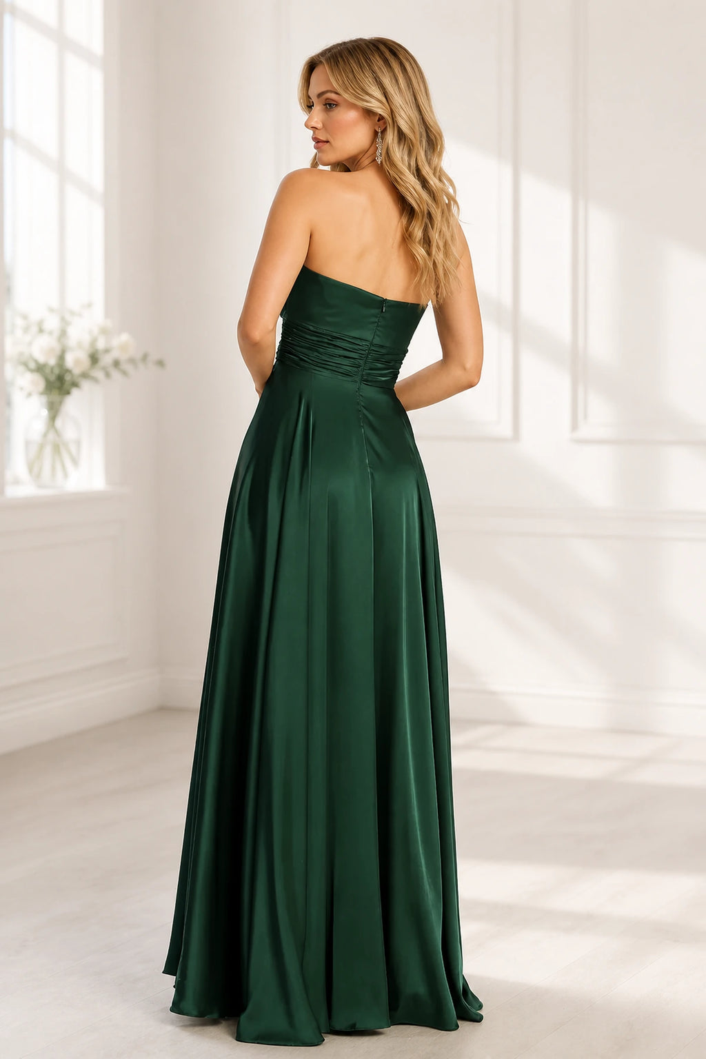 Emerald green strapless ruched zip back floor length prom dress back view
