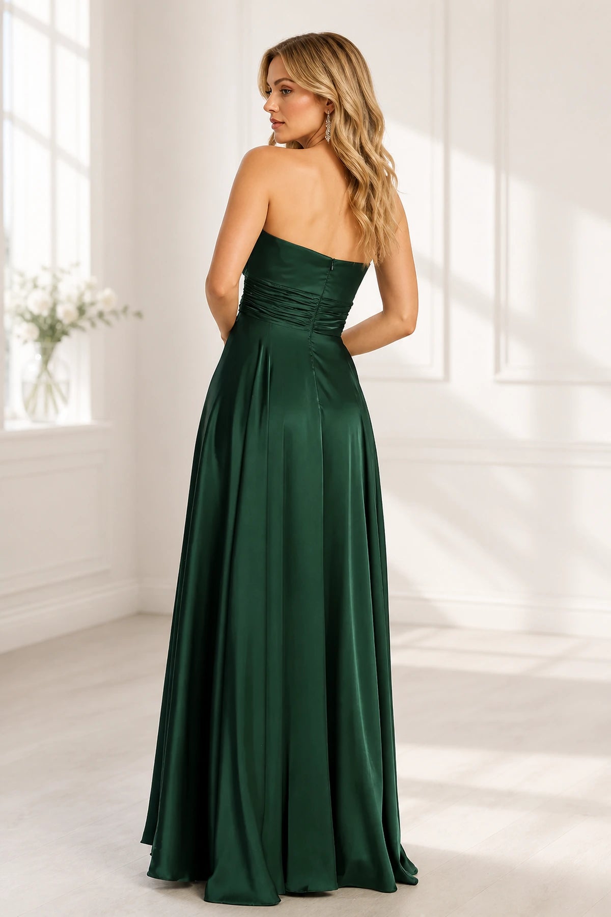 Emerald green strapless ruched zip back floor length prom dress back view