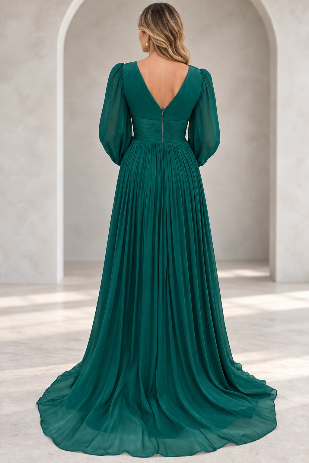 Emerald green mother of the bride dress with V back zipper closure puff sleeves and flowing A line skirt