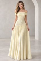 Light yellow chiffon A-line prom dress featuring an off-the-shoulder draped neckline, floral embroidered fitted bodice, and flowing floor-length pleated skirt.