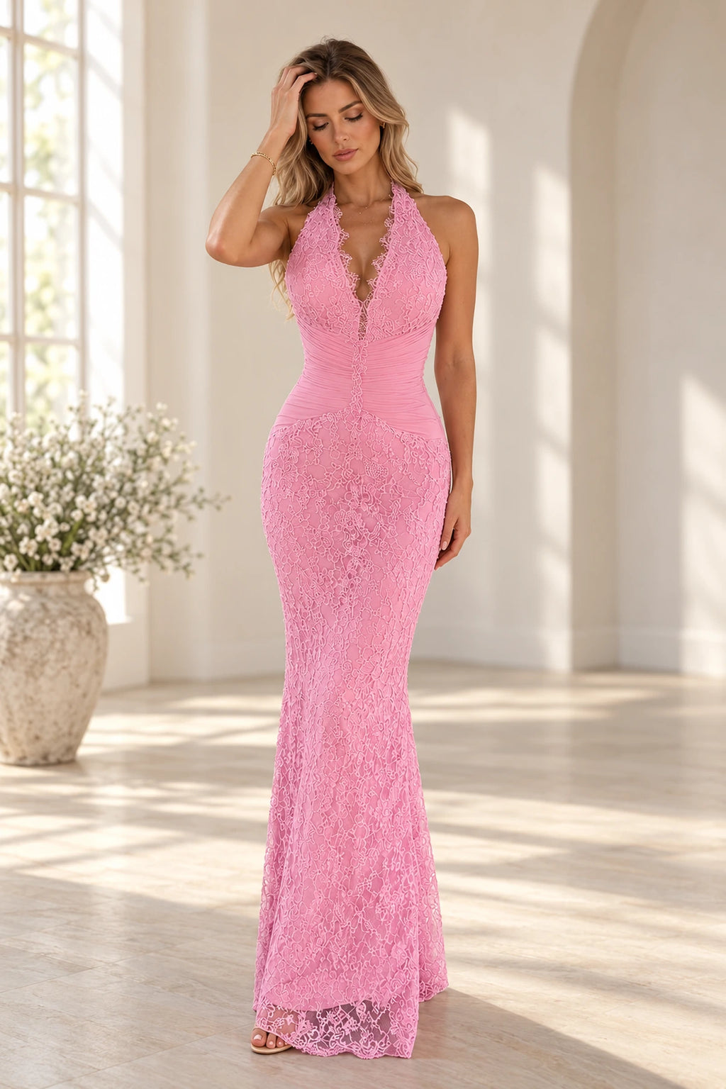 Pink floral lace mermaid evening dress with plunging V neckline, halter straps, ruched waist and floor length skirt by Graceprom