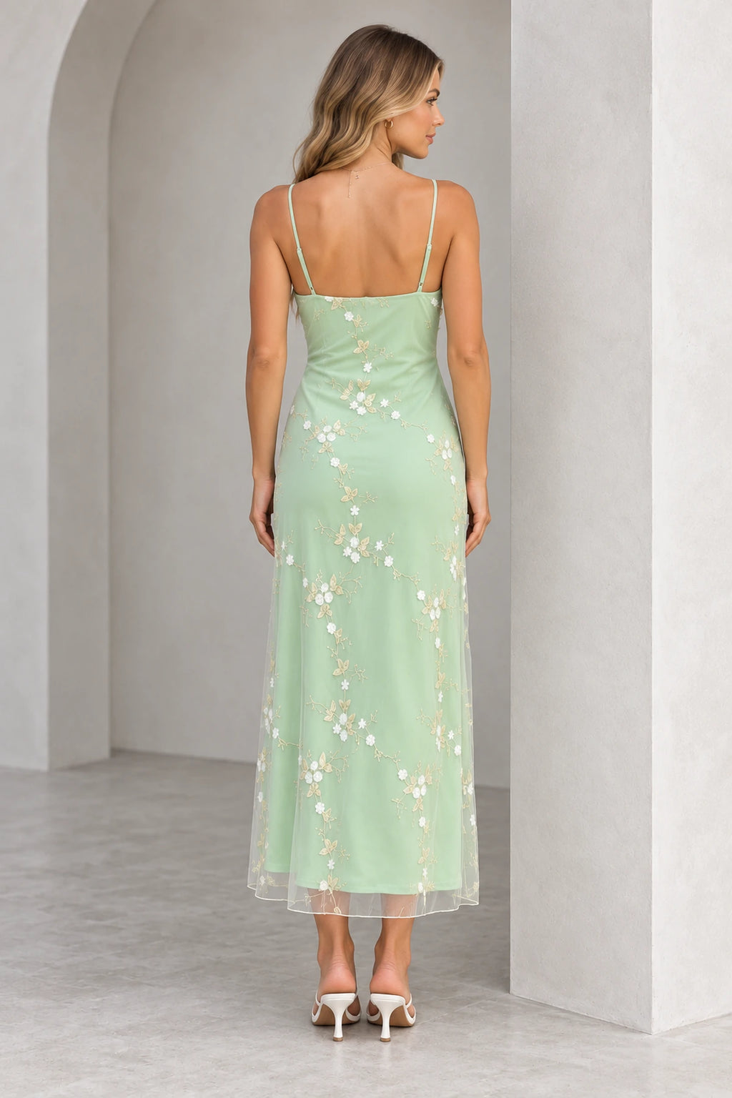 Back view of a light green Graceprom floral tulle wedding guest dress with adjustable thin straps, a low back and sheer ankle-length hem.