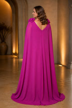 Back view of fuchsia cape sleeve wedding guest dress with V-back neckline and zipper closure