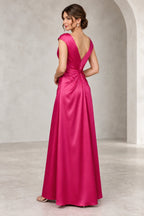 Back view of fuchsia Mother of the Bride Dress with deep V-back, ruched waist and floor-length skirt