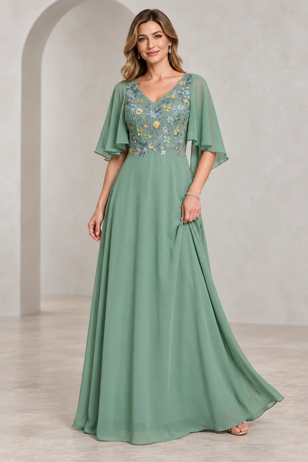 Sage green A-line Mother of the Bride Dress with floral embroidered V-neck bodice and cape sleeves