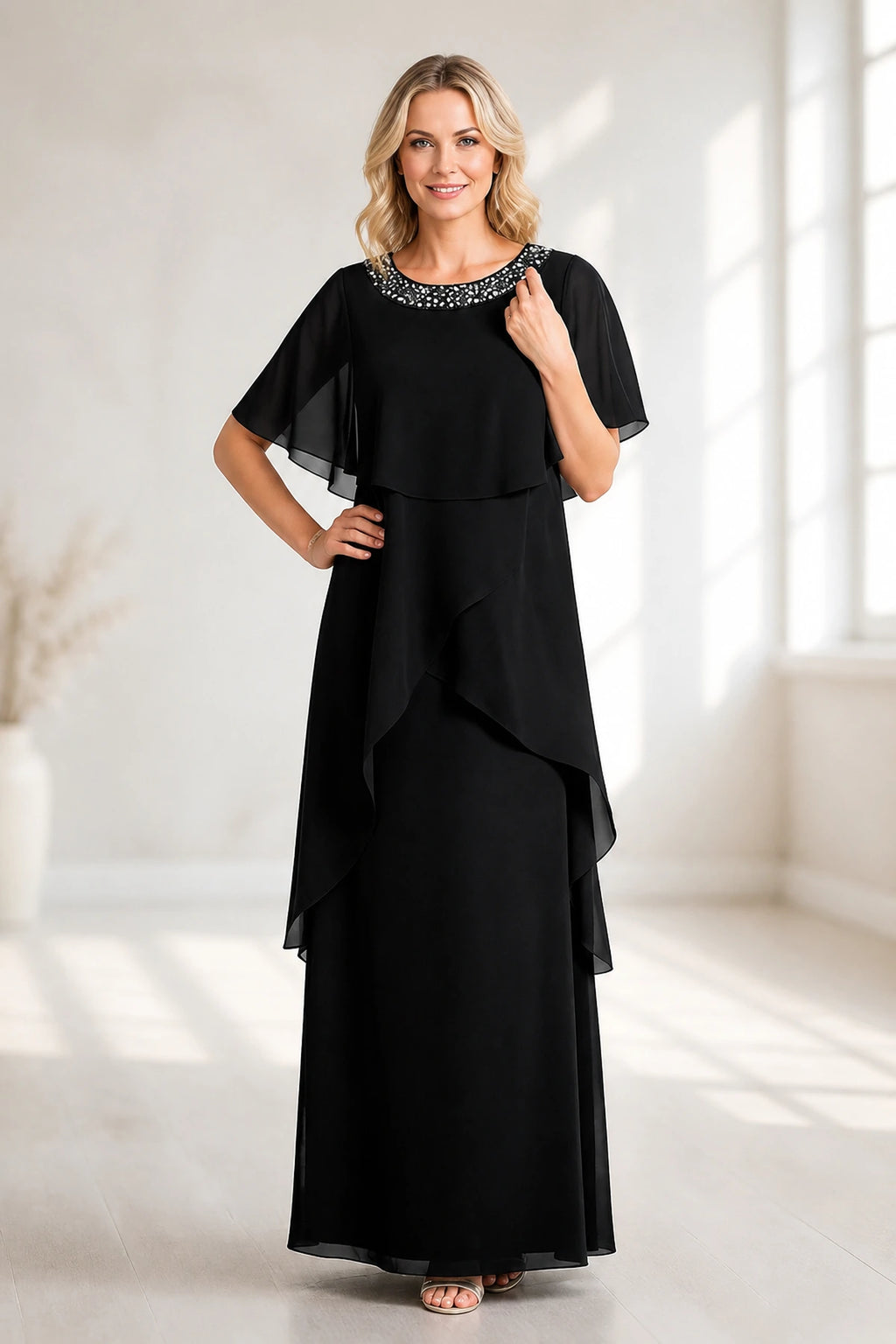 Black A-line mother of the bride dress with beaded jewel neckline, cape sleeves and layered chiffon by GraceProm