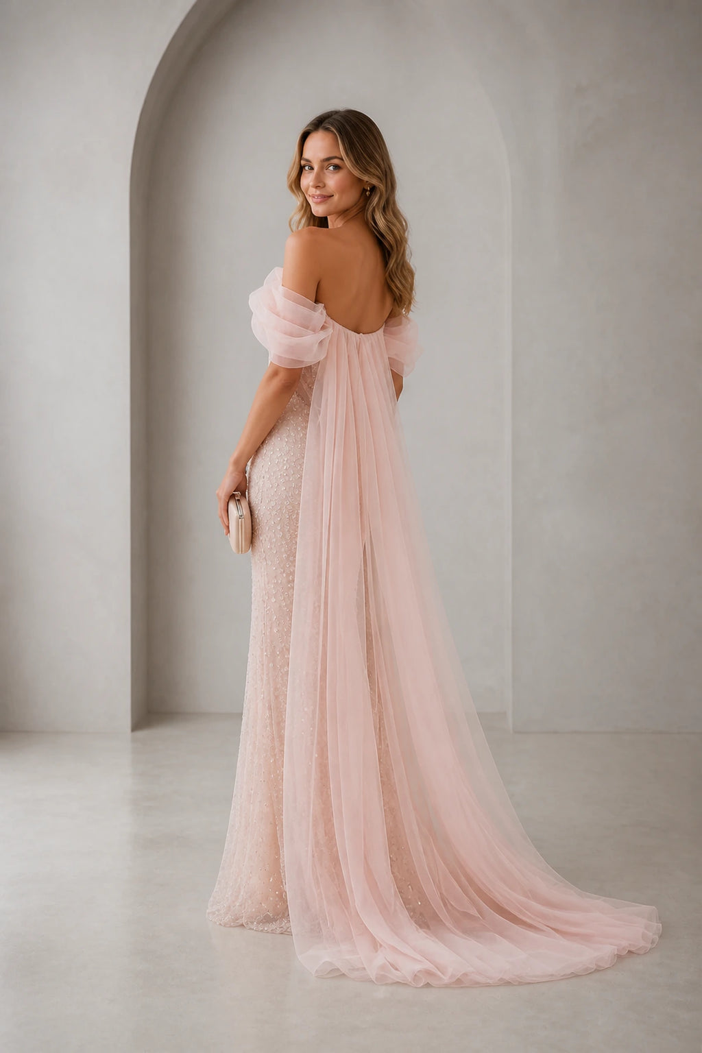 Graceprom blush pink bridesmaid gown, low back flowy tulle train sequin long dress back view