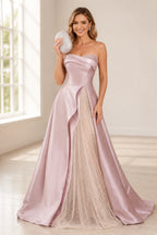 Blush pink strapless A-line wedding guest dress with sparkling sheer front panel