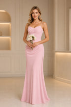 Blush pink sheath prom dress with sweetheart neckline, spaghetti straps and ruched bodice by GraceProm
