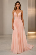 Graceprom blush pink V-neck A-line wedding guest dress with spaghetti straps and flowing pleated floor-length skirt