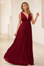 Burgundy A-line bridesmaid dress with deep V-neck, pleated bodice and ruched waist by GraceProm