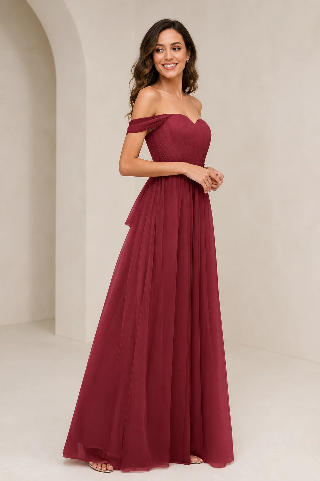 Back view of burgundy bridesmaid dress with open back and statement bow detail by GraceProm