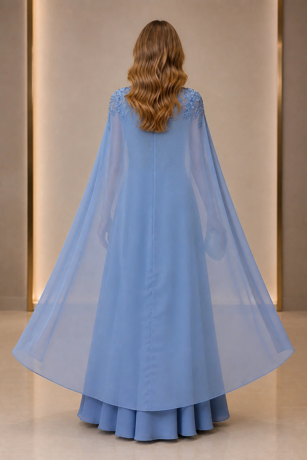 graceprom dusty blue A-line wedding guest dress back view, solid closed back, sheer cape overlay, floor length formal gown