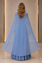 graceprom dusty blue A-line wedding guest dress back view, solid closed back, sheer cape overlay, floor length formal gown