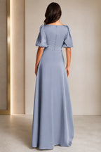 Back view of dusty blue bridesmaid dress with puff sleeves and center zipper closure by GraceProm
