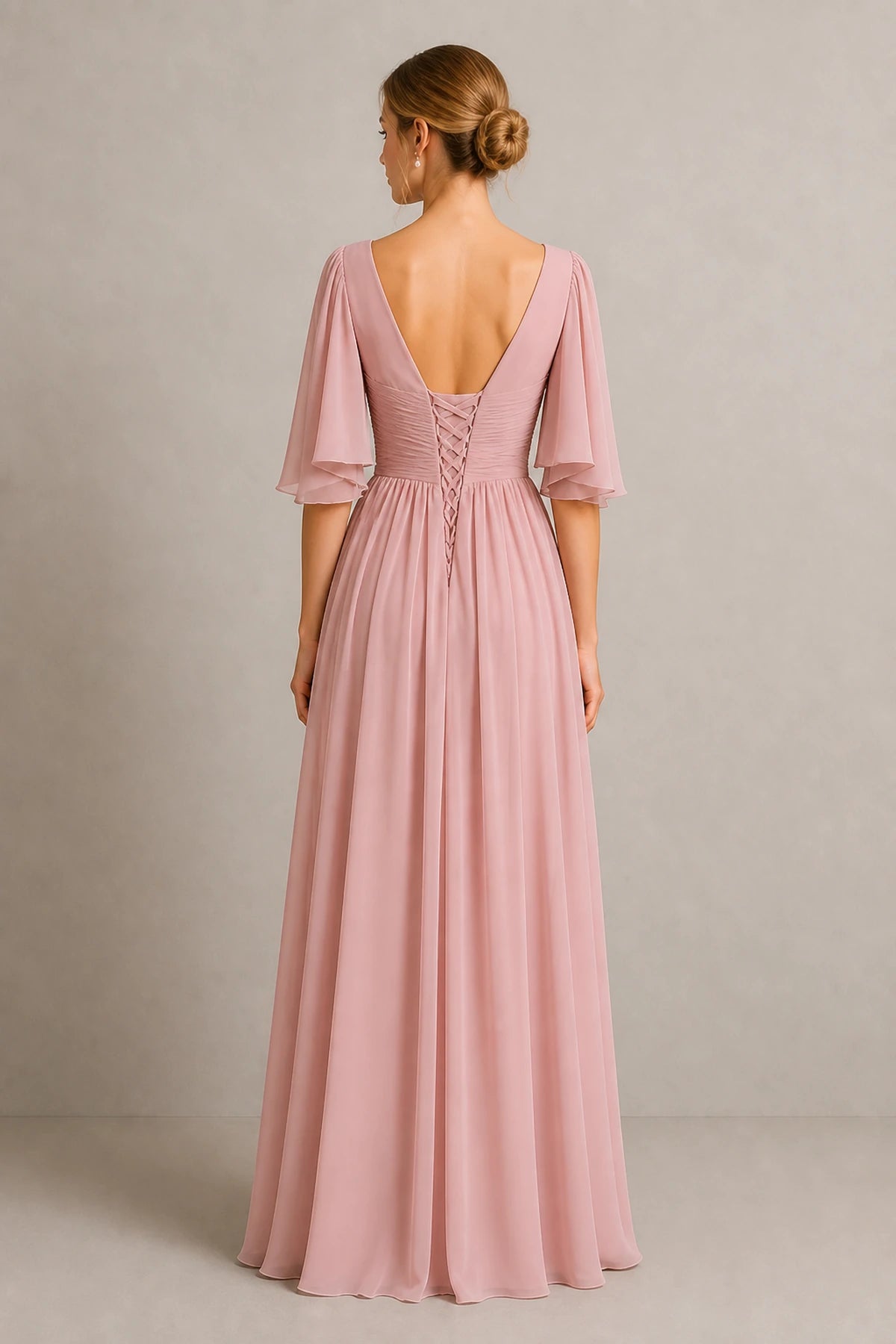 Back view of dusty rose bridesmaid dress with flutter sleeves, deep V-back and lace-up closure by GraceProm