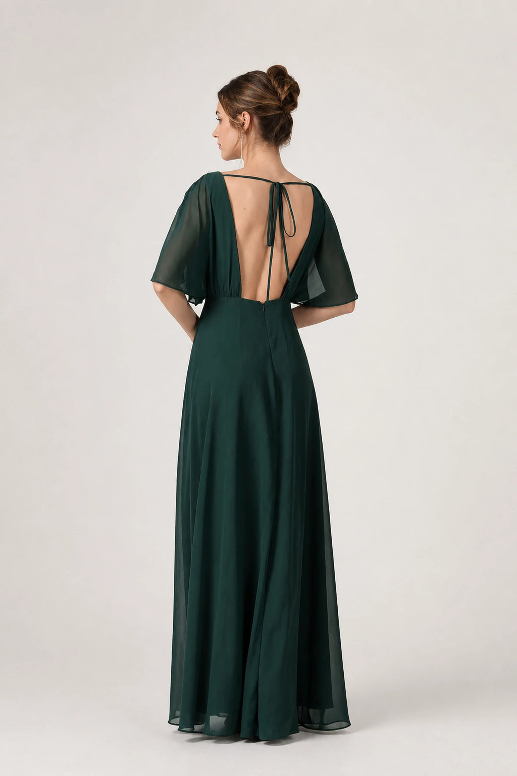 Back view of emerald green bridesmaid dress with flutter sleeves, open back and tie detail by GraceProm