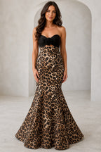 graceprom leopard print mermaid prom dress front view, strapless sweetheart neckline, black 3D rose bodice detail, fit-and-flare skirt