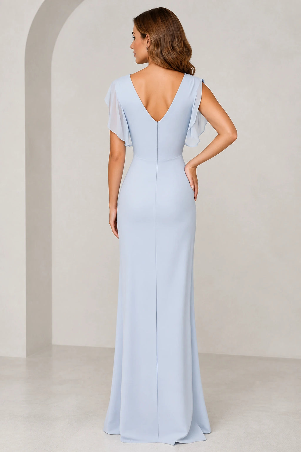 Back view of light blue floor-length bridesmaid dress with flutter sleeves, deep V-back and zipper closure by GraceProm